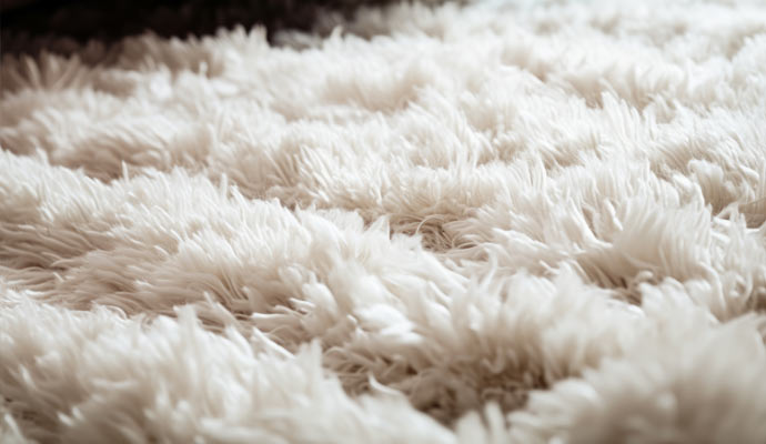 White fluffy wool rug